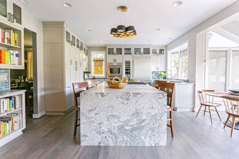 A Charleston interior design teams kitchen home renovation with a full granite countertop for a Charleston custom home feel