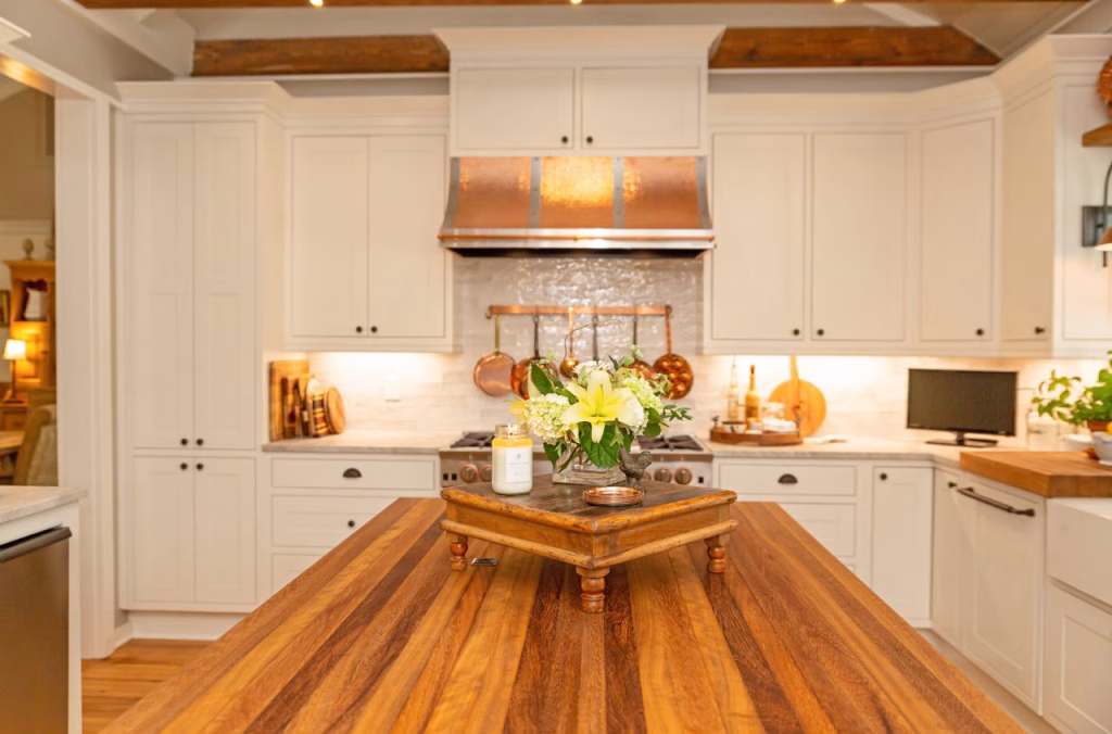 A full home renovation completed by a team of Charleston custom home builders. The kitchen has a wood countertop and custom cabinetry installed by interior designers Charleston.
